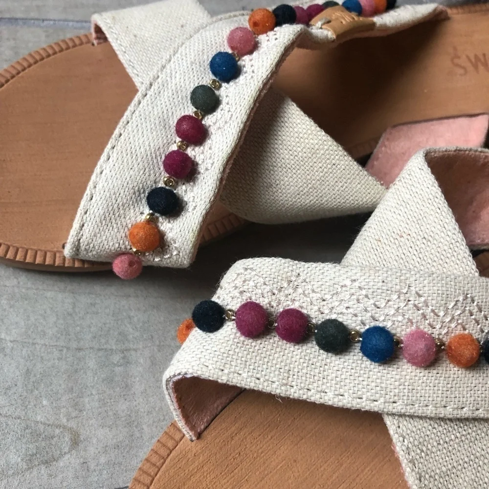 NWT! Tom’s kids’ bohemian Pom Pom sandals. Size 2